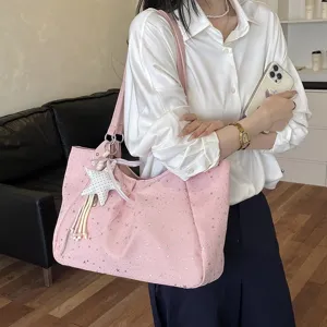 Pink star pattern tote bag for women, stylish single shoulder underarm bag for daily commuting.