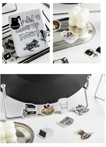 Close-up detail shot of aesthetic black and white decorative stickers for journal crafts.