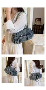 Detailansicht der Damen Vintage Waschung Jeans Umhängetasche mit mehreren Reißverschlüssen.