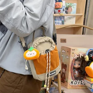 Casual fashion crossbody phone bag, contrast canvas shoulder bag with cute plush decor.