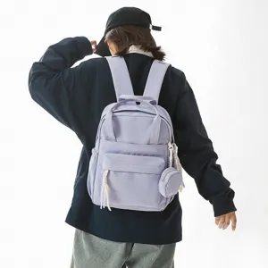 Sac à Dos Tendance en Nylon pour Femmes Couleur Unie Décontracté Sac de Voyage Léger Sac d'École Avec Pendentif Mini Porte-Monnaie