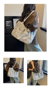 Detail view of the casual Korean style large capacity canvas tote shoulder bag for women.