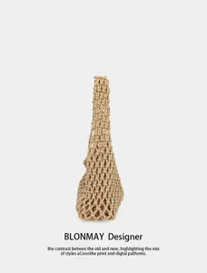 Detailed view of the stylish beige woven macrame shoulder bag showcasing intricate rope knots.