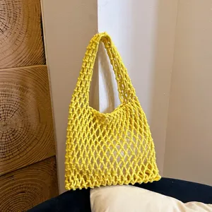 Yellow handmade crochet mesh shoulder bag, stylish minimalist hollow-out woven casual shoulder tote.