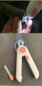 LED pet nail clipper with light and nail file for cats and dogs, safe claw trimmer tool.
