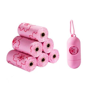 Pink dog poop bags set with dispenser, cute floral pattern pet waste pickup bags rolls.