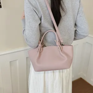 Sac à main bandoulière femme en cuir rose élégant sac seau minimaliste chic et tendance