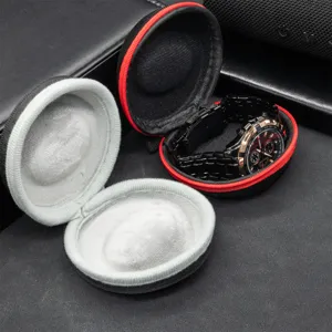 Portable watch storage box with zipper and soft velvet interior for mechanical and smart watches.