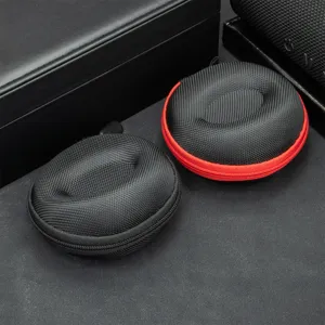 Portable round watch storage case with durable woven texture and zipper closure for mechanical watches.