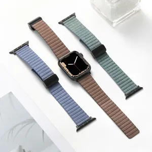 Close-up detail of magnetic folding buckle leather watch bands in multiple colors.