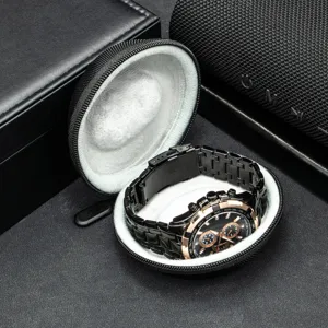 Portable watch travel case with luxury mechanical chronograph display inside detail shot.