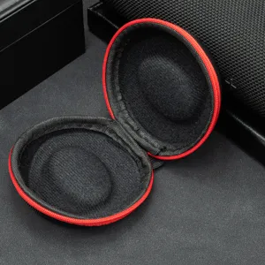 Portable round watch storage case with red zipper, black protective EVA travel pouch.