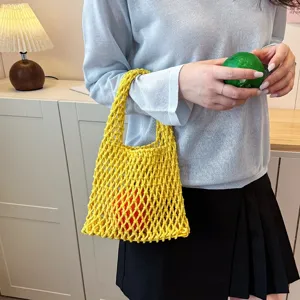 Spring new women yellow knitted net bag simple niche design shoulder tote bag stylish