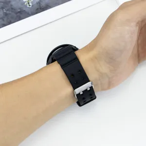Silicone watch strap and protective case set detail showing black texture and buckle.