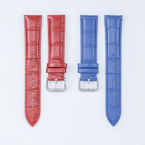 Vue détaillée des bracelets de montre en cuir véritable avec motif croco et boucles.
