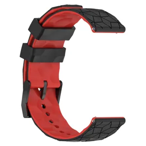 Siliconen horlogeband detail met zwart en rood geometrisch getextureerd ontwerp.