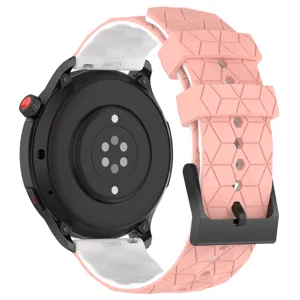 Siliconen horlogeband detailweergave, geometrische textuur roze en wit met 22mm connector.