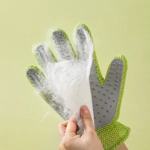 Pet hair removal grooming glove with silicone tips for cats and dogs, easy cleaning pet supply tool.