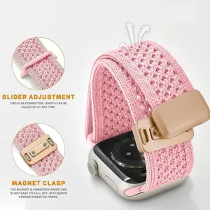Pink braided nylon magnetic watch band replacement strap with slider adjustment for smartwatch.