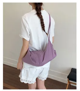Casual purple grid shoulder bag for women, slouchy tote handbag for daily school commute.