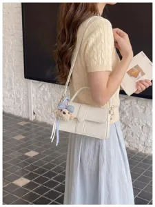 Chicke koreanische Schulter-Umhängetasche für Damen, stilvolle weiße PU-Ledertasche.
