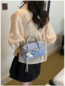 Casual denim colorblock shoulder bag for women, stylish commuting handbag, chic design.