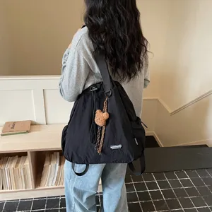 Korean style commuter fashion bucket bag with large capacity, versatile nylon backpack.
