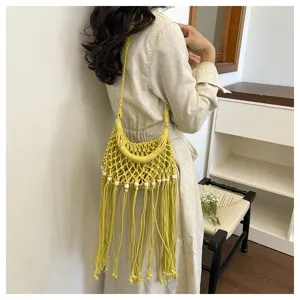 Gele geweven crossbody tas voor dames, zomerse handtas met franjes, uitgeholde strandtas.