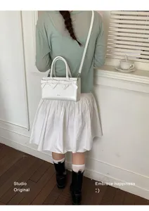 Borsa a tracolla bianca chic con fiocco da donna, borsa elegante dal design raffinato.