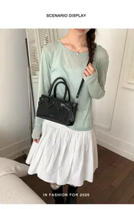 Elegante borsa nera con fiocco da donna, pratica borsa a tracolla chic per ogni giorno.