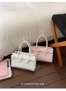 Borsa a mano con fiocco estiva e tracolla, elegante borsa in pelle da donna con fiocco.