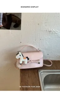 Bolso de mano rosa con lazo para mujer, elegante bandolera con abalorio de caballo y perlas.