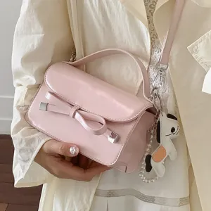 Bolso de mano de charol rosa con lazo bolso cruzado de moda para mujeres diario