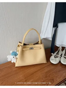 Versatile vintage women handbag elegant top handle tote bag casual shoulder bag for daily commuting.