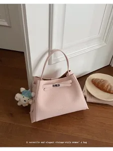 Pink leather handbag, classic top handle bag with turn-lock closure, stylish commuter tote.