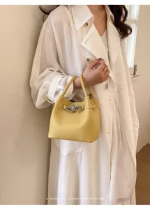 Bolso cubo minimalista de cuero para mujer con asas y cierre elegante bolso amarillo elegante