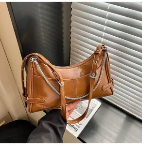 Borsa a tracolla retrò in pelle marrone da donna, elegante borsa vintage giornaliera.
