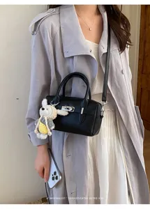 Schwarze Litchi-Muster Bowling Handtasche stilvolle Retro Umhängetasche mit Metallschloss.