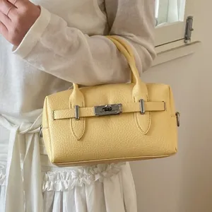 Gelbe Litschi-Muster Bowling Handtasche für Damen, modische, vielseitige Umhängetasche.