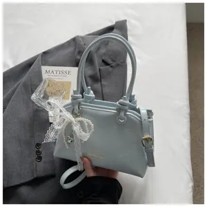 Hellblaue PU-Leder Handtasche mit Perlen-Spitzenanhänger, elegant für Schulter und Umhänge.