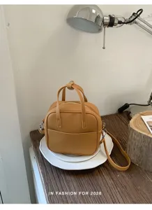 Elegante kleine PU Leder Damen Umhängetasche Detailansicht zeigt Textur und feines Design.