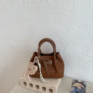 Brown woven bucket handbag for women, chic fashion stylish shoulder and crossbody bag.