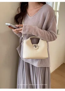 Minimalistische Litschi-Muster Eimer Tasche mit Metallverschluss für Damen Alltag.