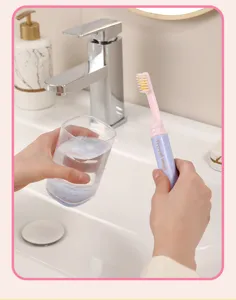 Portable travel folding toothbrush with soft bristles, compact and lightweight design for daily use.