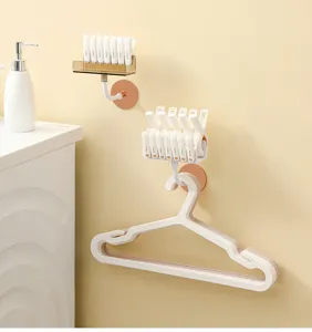 Soporte de pared para perchas y pinzas, diseño sin taladro para organizar el balcón.