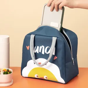 Insulated lunch bag with cute cartoon egg pattern, large capacity portable bento box.
