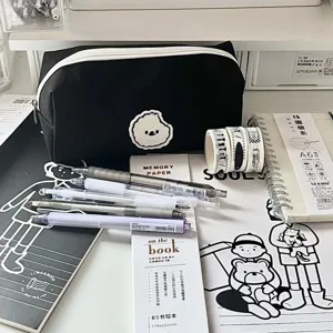 Black canvas pencil pouch with cute dog patch, large capacity stationery storage bag for students.