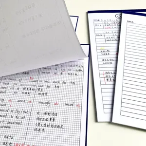 Detailed view of B5 grid and lined sticky note paper with handwritten study notes inside.