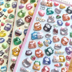 Close-up detail of 3D puffy crystal relief cute cartoon animal stickers for phone and journal decor.
