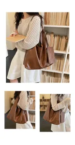Brown large capacity shoulder tote bag, stylish casual commuting bucket bag with side pouch detail.